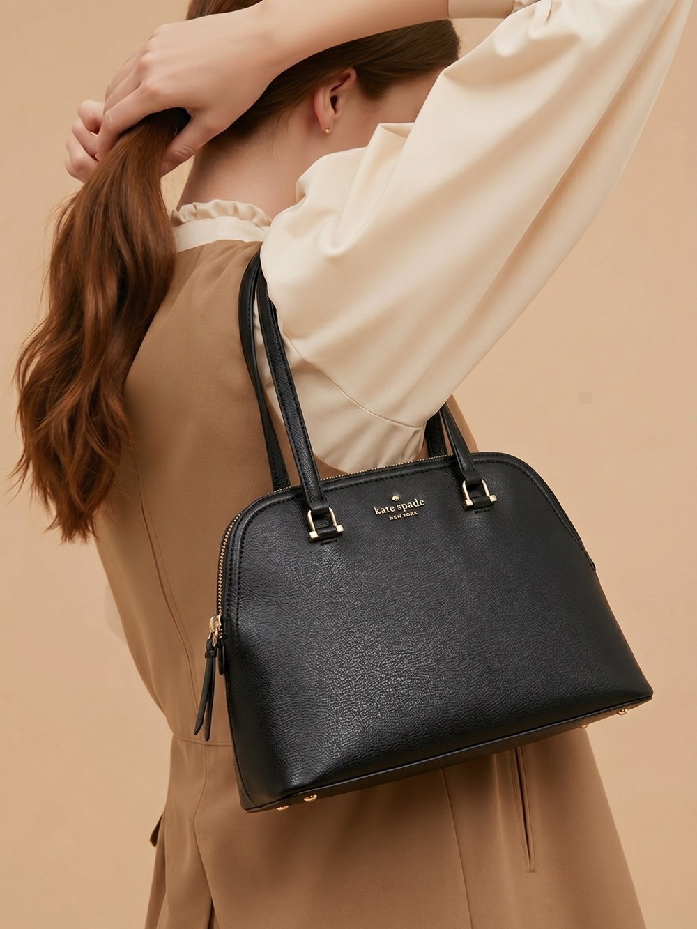 kate spade black leather dome tote with gold-tone accents